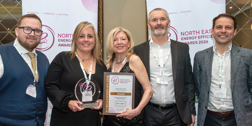 Group photo featuring North Star's trophy and certificate 
