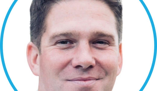 A headshot of a young man