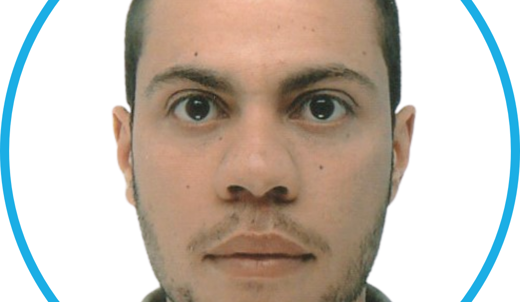 A headshot of a young man